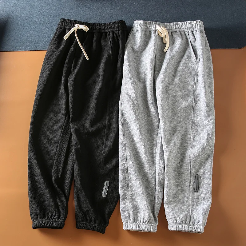 

Новые осенние мужские спортивные брюки с эластичным поясом, модные повседневные брюки с манжетами, длинные брюки из текстурированной ткани с вышивкой