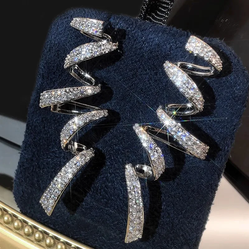 أقراط متدلية على شكل شريط دوار مبهر مع زركونيا مكعبة وإكسسوارات مجوهرات حفلات نسائية أنيقة وعصرية