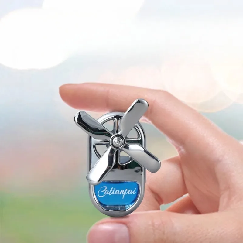 Rotating Four-Leaf Windmill Car Decor | Air Vent Fan with Essential Oil Fragrance | Car Perfume Aromatherapy Accessory