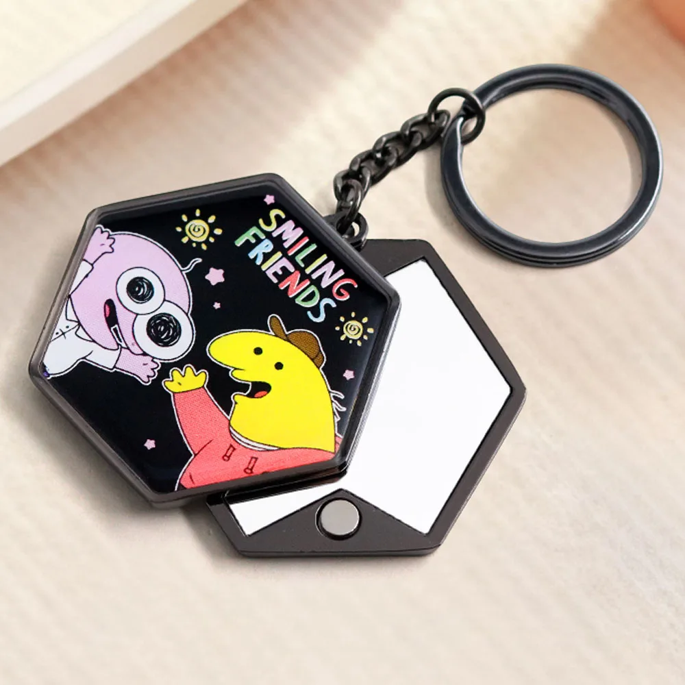 Llavero con espejo de doble cara de amigos sonrientes con personajes de Pim y Charlie, llavero de animación de comedia creativa, colgante de regalo para seguidor