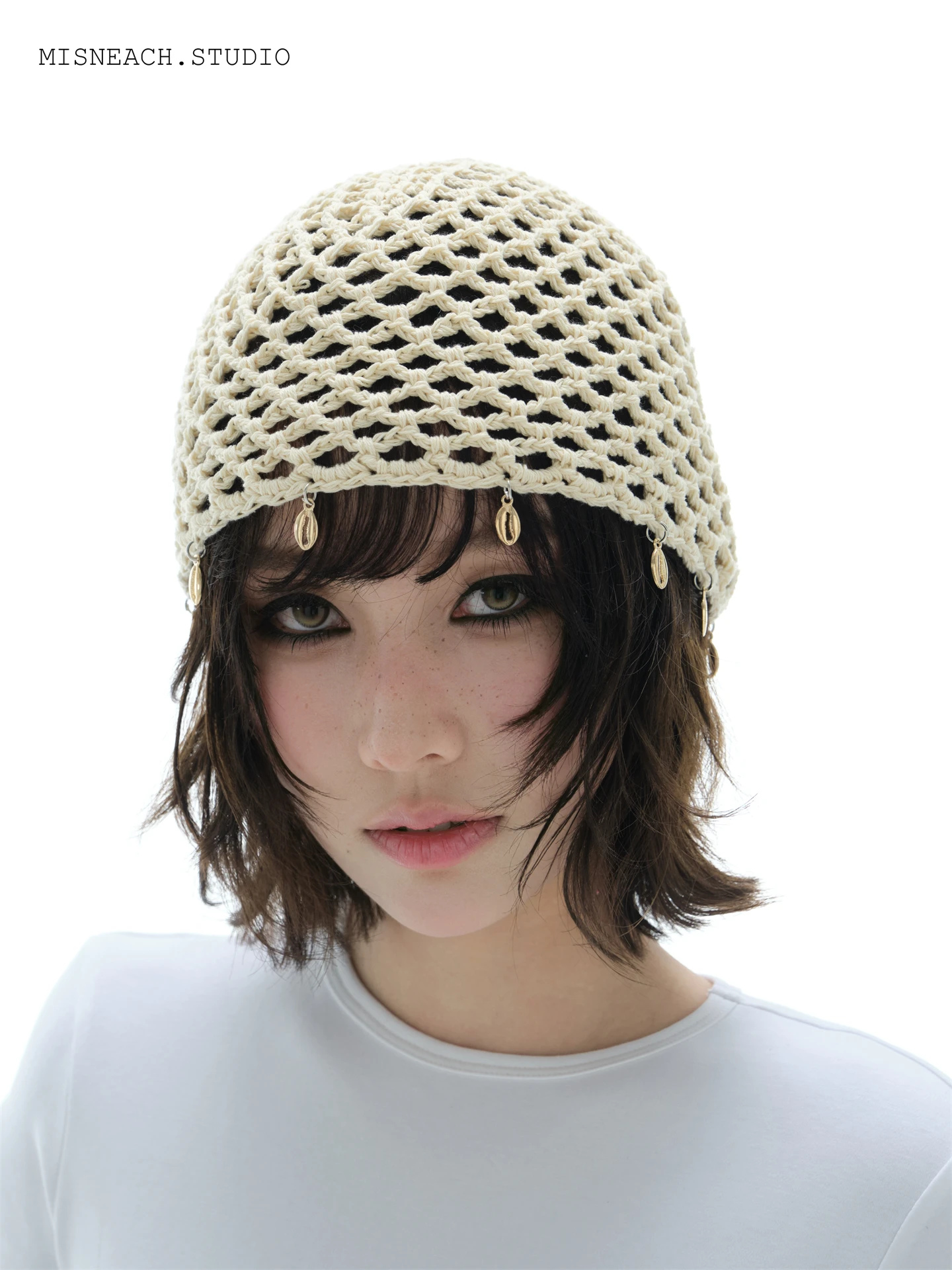 

Hand-Knitted Metal Pendant Hollow out Turtleneck Hat Women Fashionable Sexy Fish Net Hat Overhead Cold Cap Breathable