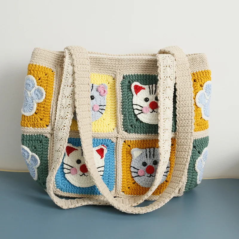 Hand crocheted shoulder bag, cartoon spear cat head checkered women's bag, wool crocheted shoulder bag finished product