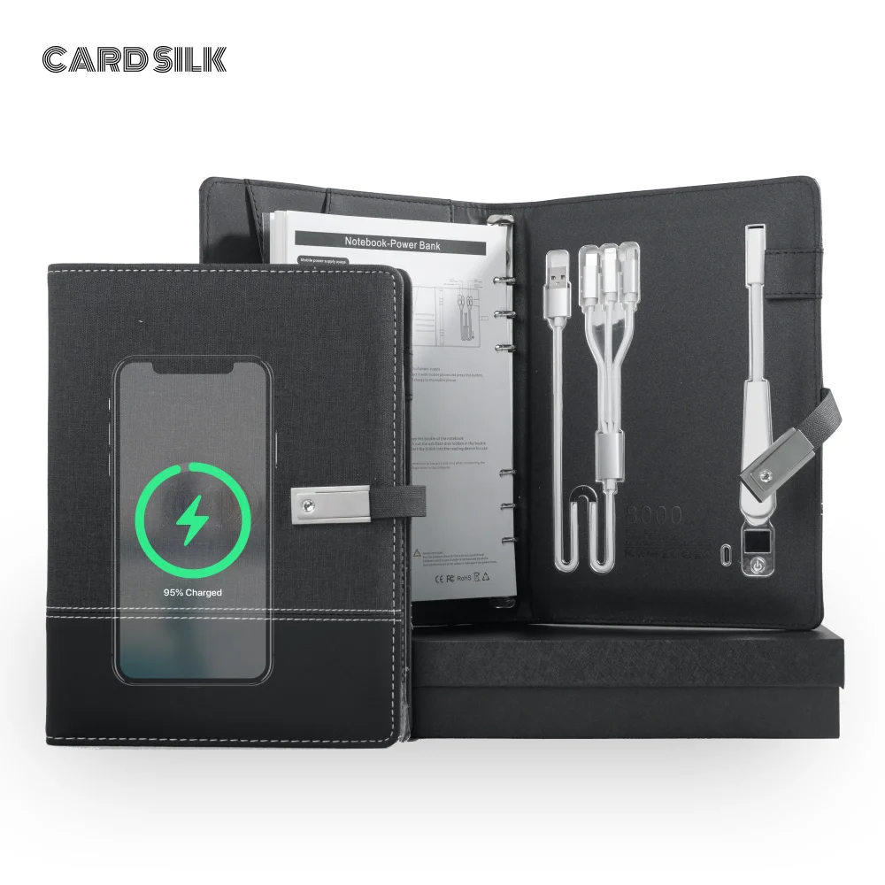 

A5 Notebook with built-in Power Bank, wireless Charging, 3-in-1 charging cable, Table light, USB drive. Journal for Office.