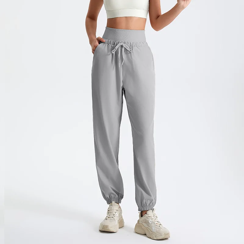 Pantaloni da jogging da donna pantaloni sportivi da Yoga a vita alta con coulisse pantaloni da corsa a gamba larga pantaloni sportivi larghi da palestra elastici ad asciugatura rapida