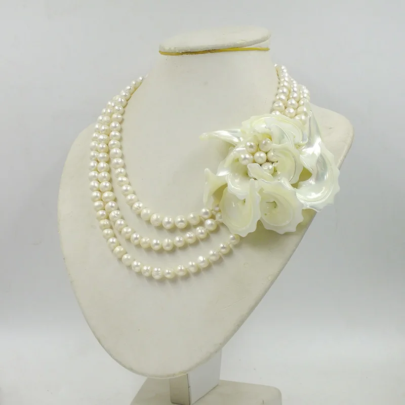 The latest design.3 layers of 8MM grade A natural freshwater pearls.Shell flower necklace.Bride's wedding Jewelry