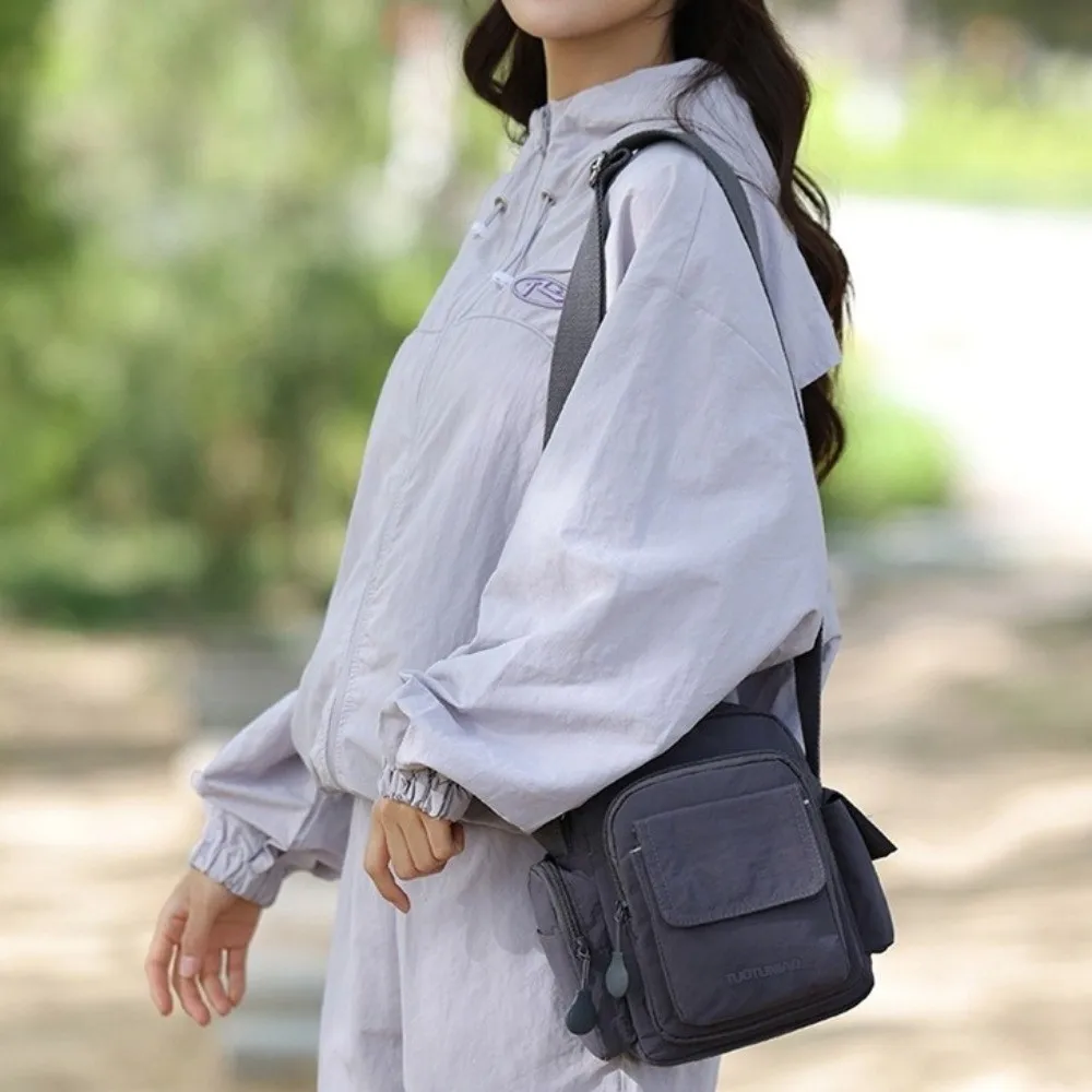 

Водонепроницаемая сумка через плечо большой вместимости с множеством карманов, нейлоновая уличная сумка через плечо, регулируемая сумка квадратной формы для поездок на работу