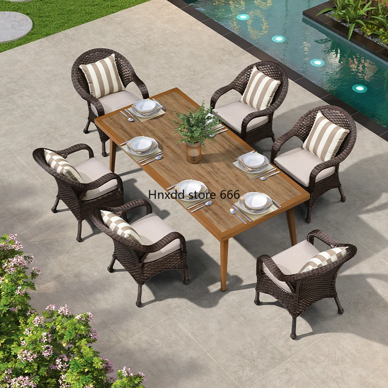 Outdoor rattan waterproof and sunscreen courtyard villa leisure rattan table and chair combination