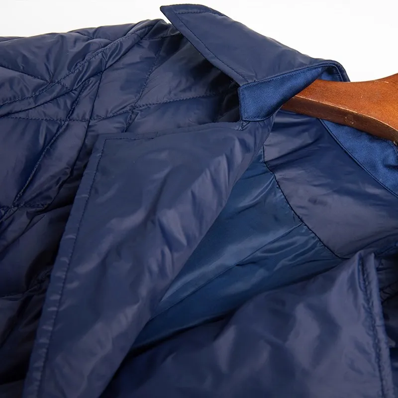 Damska zimowa niebieska kurtka puchowa, ocieplana, lekka, z wypełnieniem z kaczego puchu, idealna na narty, śnieg i na co dzień.