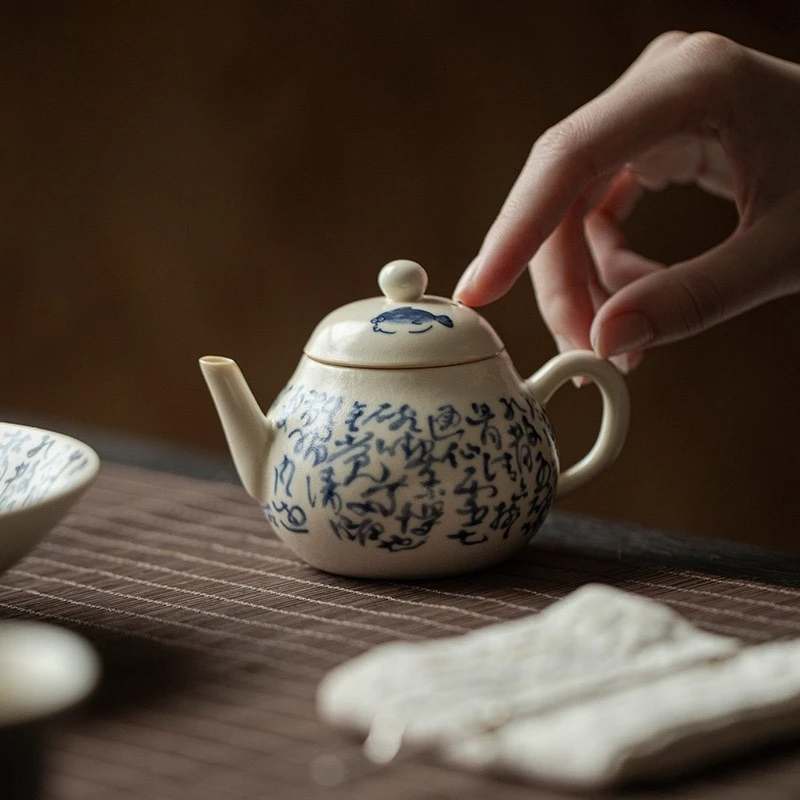 soda-glaze-blue-and-white-poetry-teapot-hand-held-pot-with-filter-pure-handmade-ceramic-teapot-dry-brewing-plate-kung-fu-tea-set