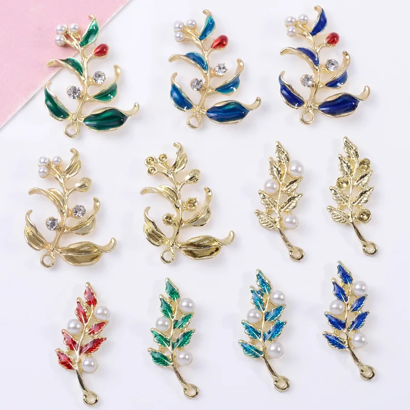 

100Pcs sets new inlaid pearl branches leaves dripping oil DIY handmade clothing bags and accessories spot wholesale