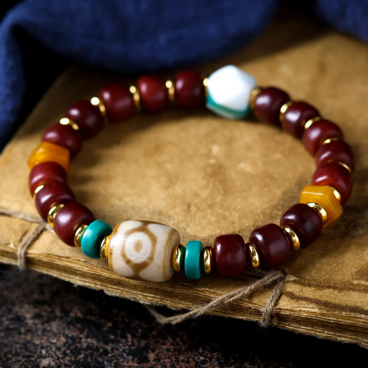 

Tibetan Style Blood Bone Barrel Bead Bracelet with Black Gold Three Eye Dzi Bead and Calcified Agate Ethnic Jewelry Gifts