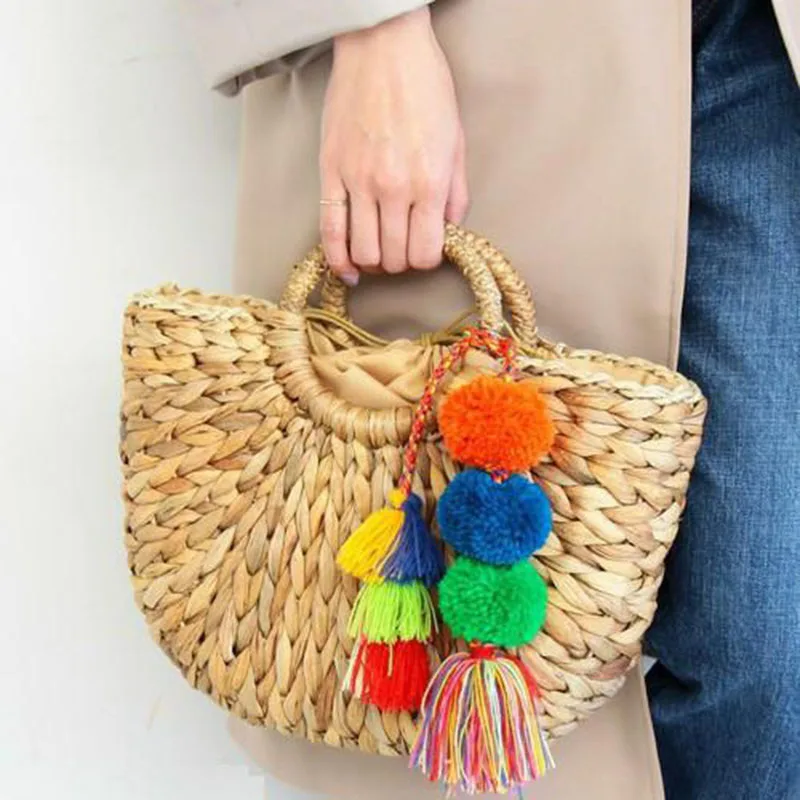 Hand woven corn skin handbag 2024 new tassel ball women bag summer vacation travel bag