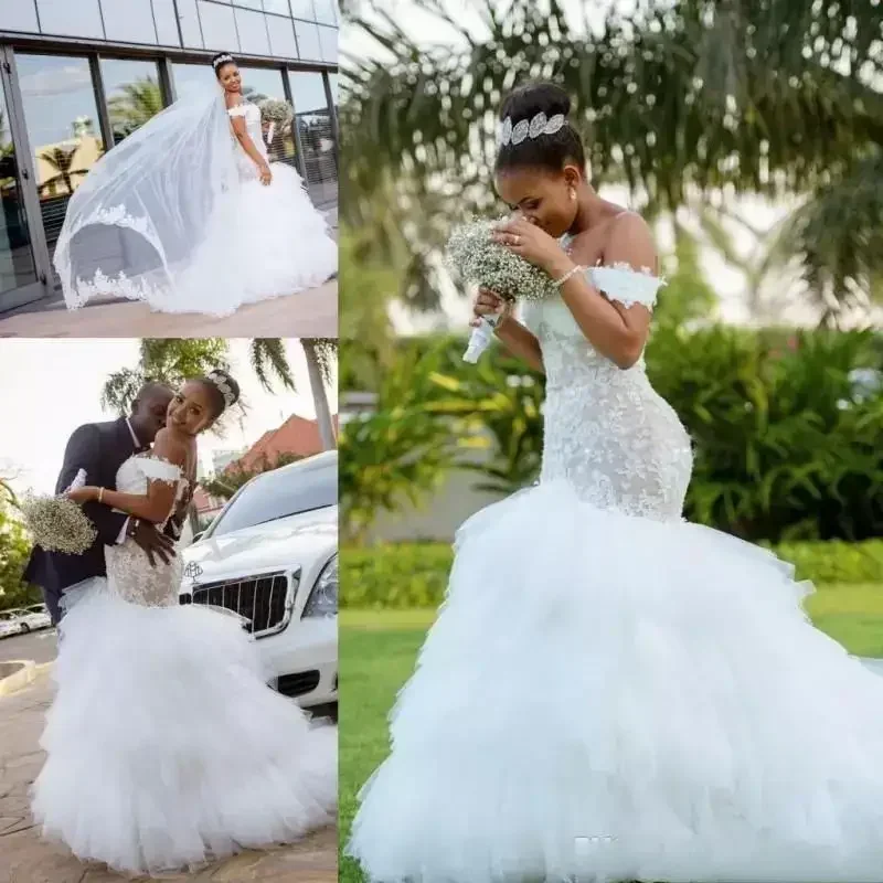 Maßgeschneiderte Vestidos De Noiva Afrikanische Meerjungfrauen-Brautkleider 2023, Spitzen-Brautkleider mit freiem Schulterbereich, Brautkleid mit Stufen-Tüll