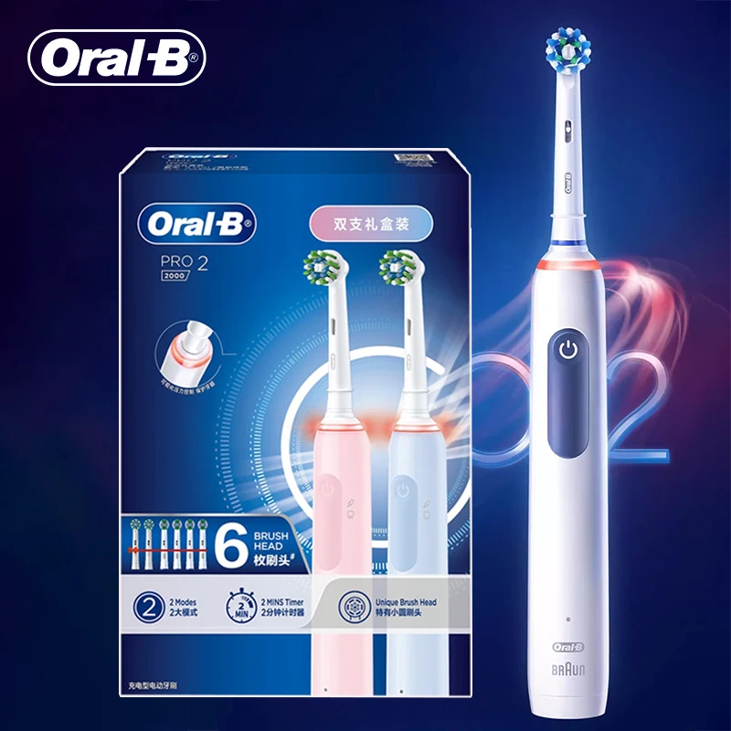 

Oral B Pro2 2-in-1 Set Blue&Pink Electric Toothbrush 2 Handles 6 Brush Heads 1 Charger