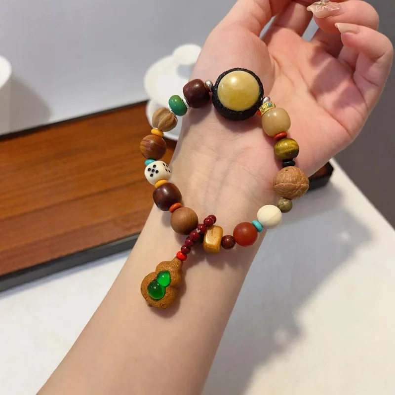 Manmi Duobao Bracelet With Cliff Cypress, Imitation Turquoise, Hawthorn Seeds, Bone Dice, Agate