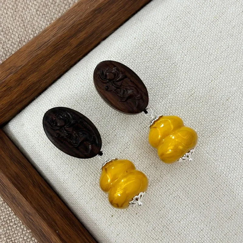 New Chinese ebony relief lotus earrings, retro intangible cultural heritage lacquer gourd long earrings, national style Fulu