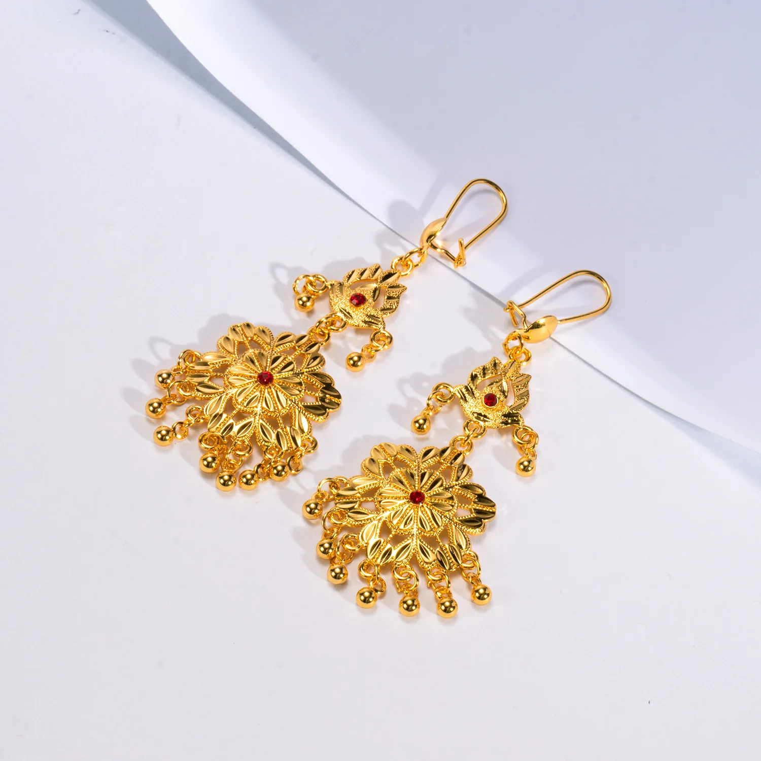 9999 gold ethnic style ruby snowflake-shaped fringed earrings Bohemian style earrings with high-end appeal