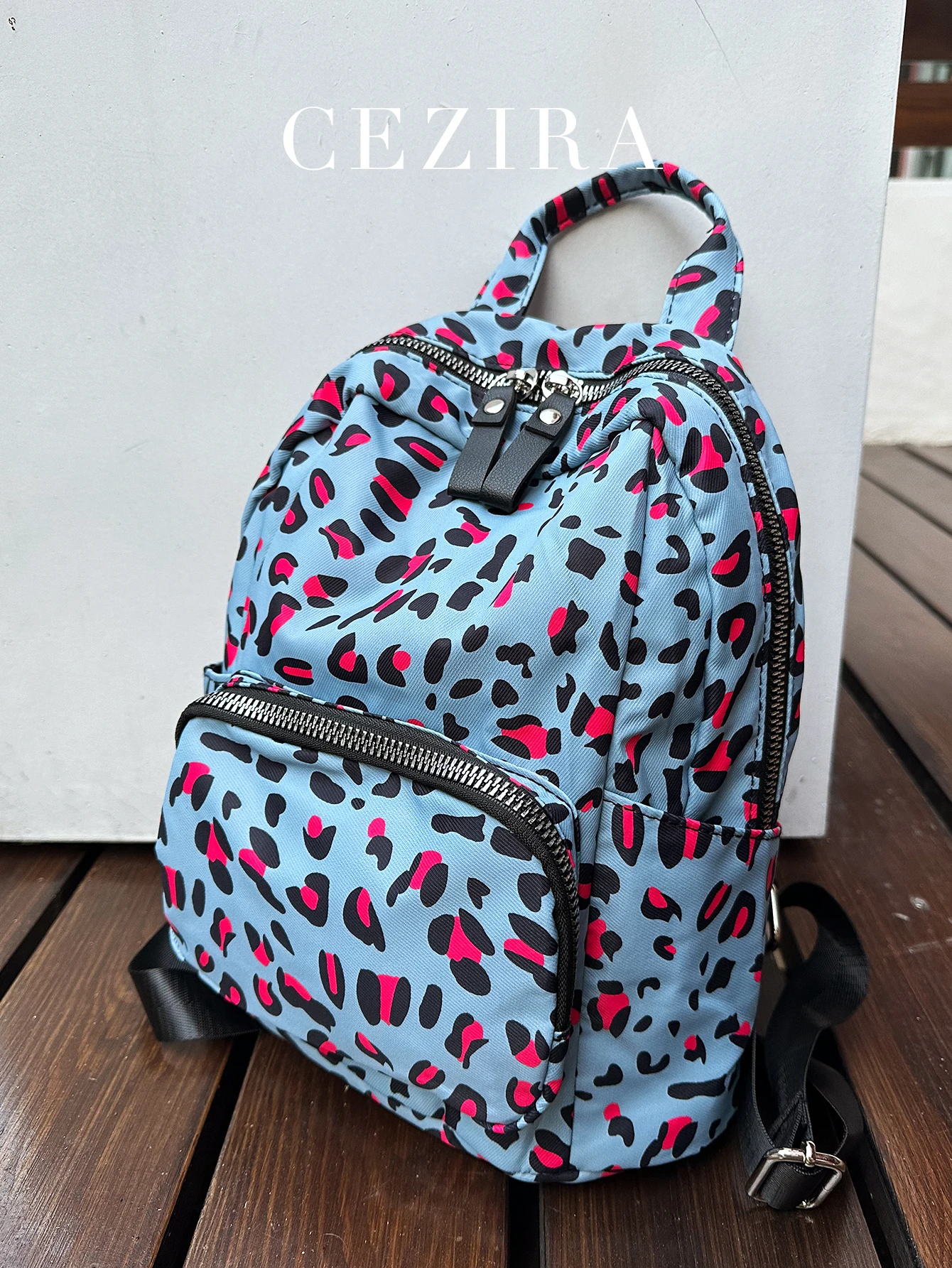 CEZIRA-mochila con estampado de estrellas y leopardo para mujer, morral ligero, impermeable, con múltiples bolsillos, de nailon suave, con cremallera, a la moda, para viaje diario y escuela