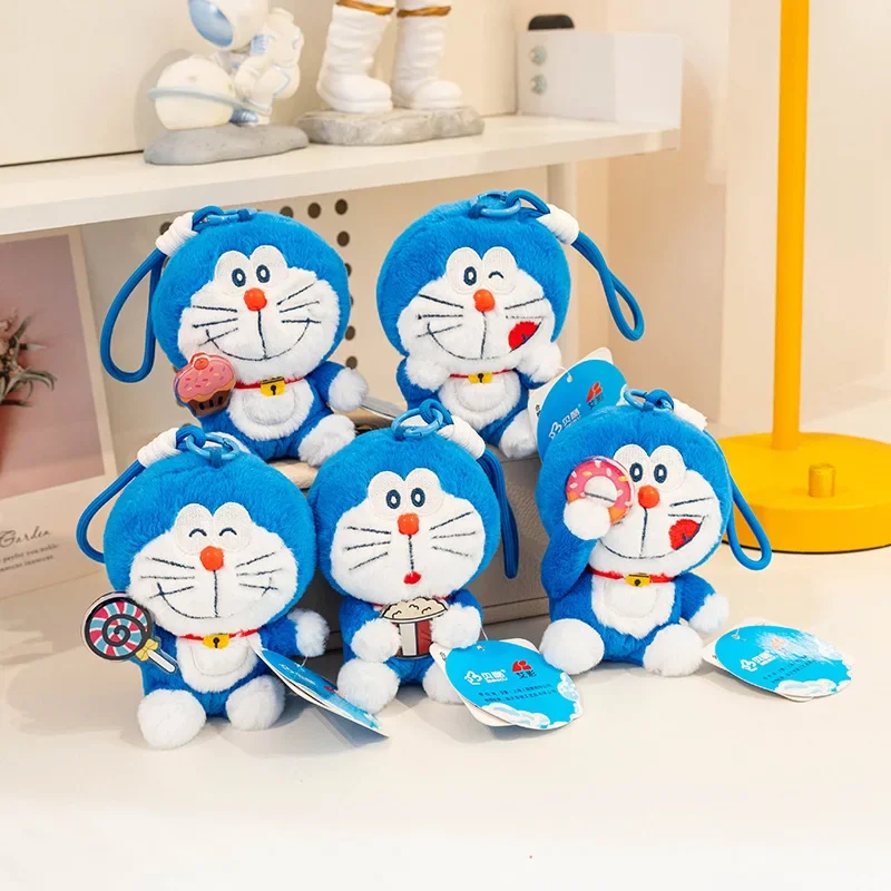 Original feliz Doraemon juguete de peluche bolsa colgante relleno Anime llavero Doraemon Hold Donut Lollipop pastel muñeca regalos de navidad niña
