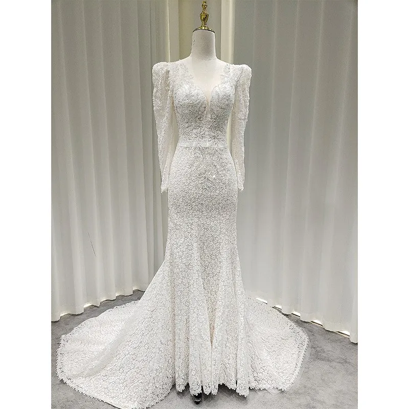 

The new light gauze lace long-sleeved welcome dress with a fishtail