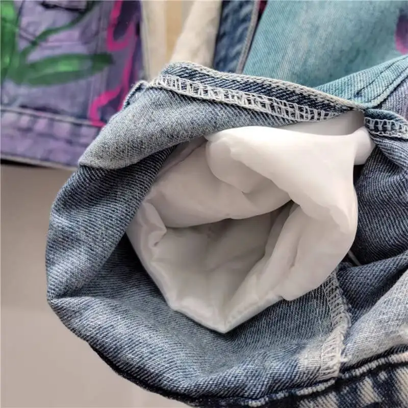 ANJY شتاء جديد إمرأة موضة مبطنة بالصوف الثقيلة الكتابة على الجدران طباعة رسالة قصيرة الدنيم معطف مبطّن المد شيك سترة دافئة A14892