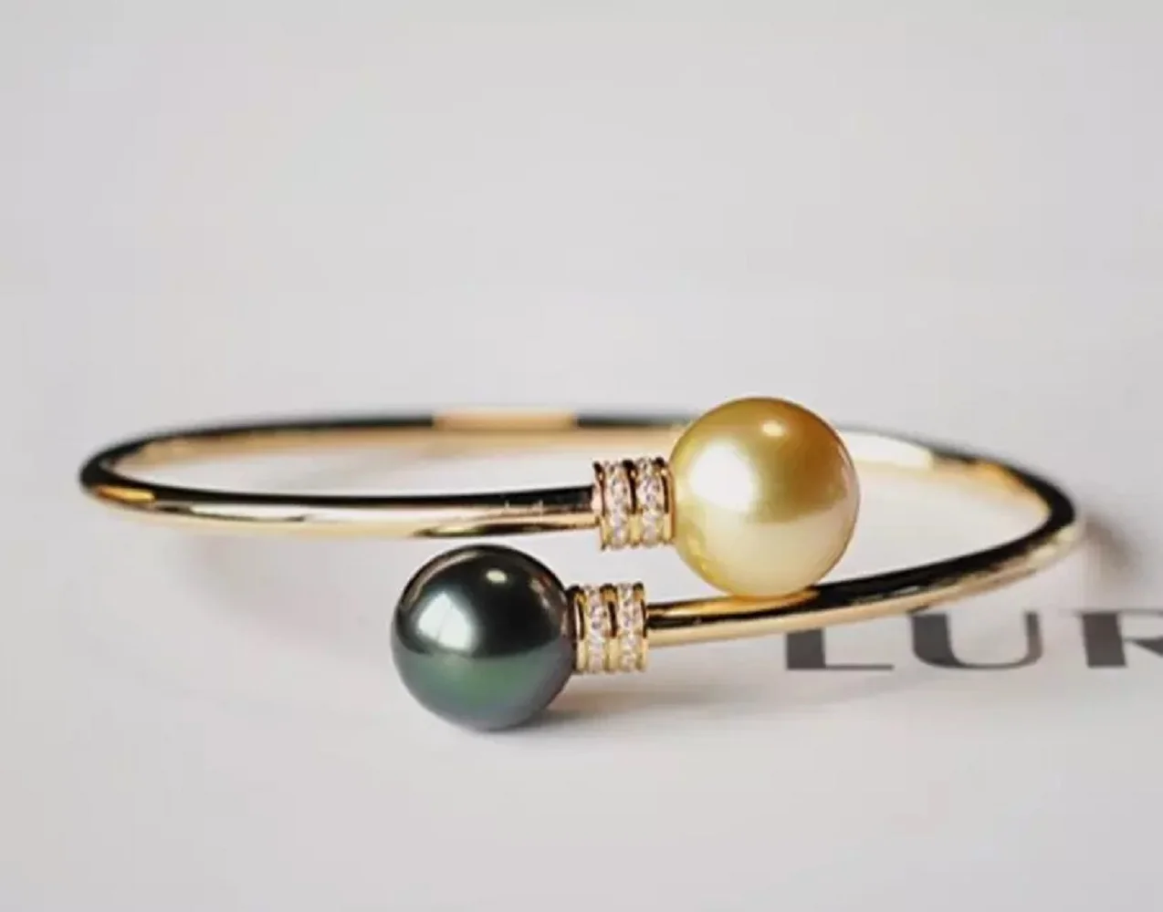 

Великолепный жемчужный браслет AAAA++9-10 мм Натуральный круглый браслет из черного золота Nanhai с жемчугом 925s