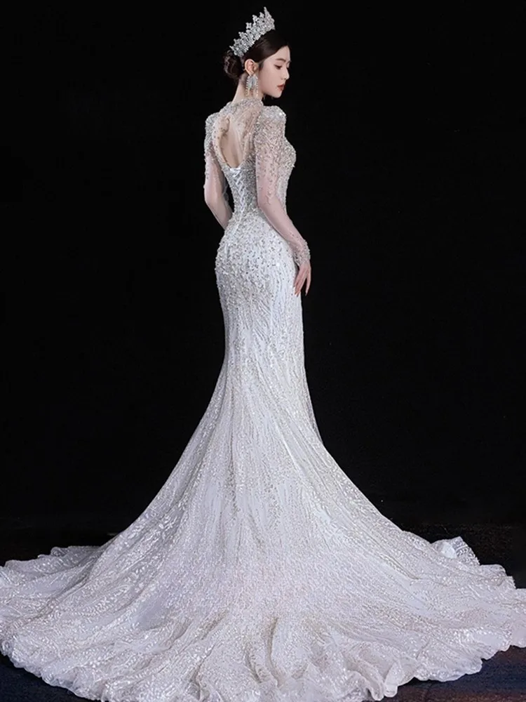 

A new fishtail light luxury long-sleeved main fabric heavy industry dress