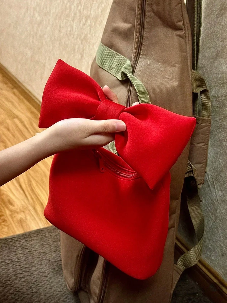 

2025 new cute mini bow handbag, fashionable and casual daily commuting women's bag, cloud bag suitable for daily use