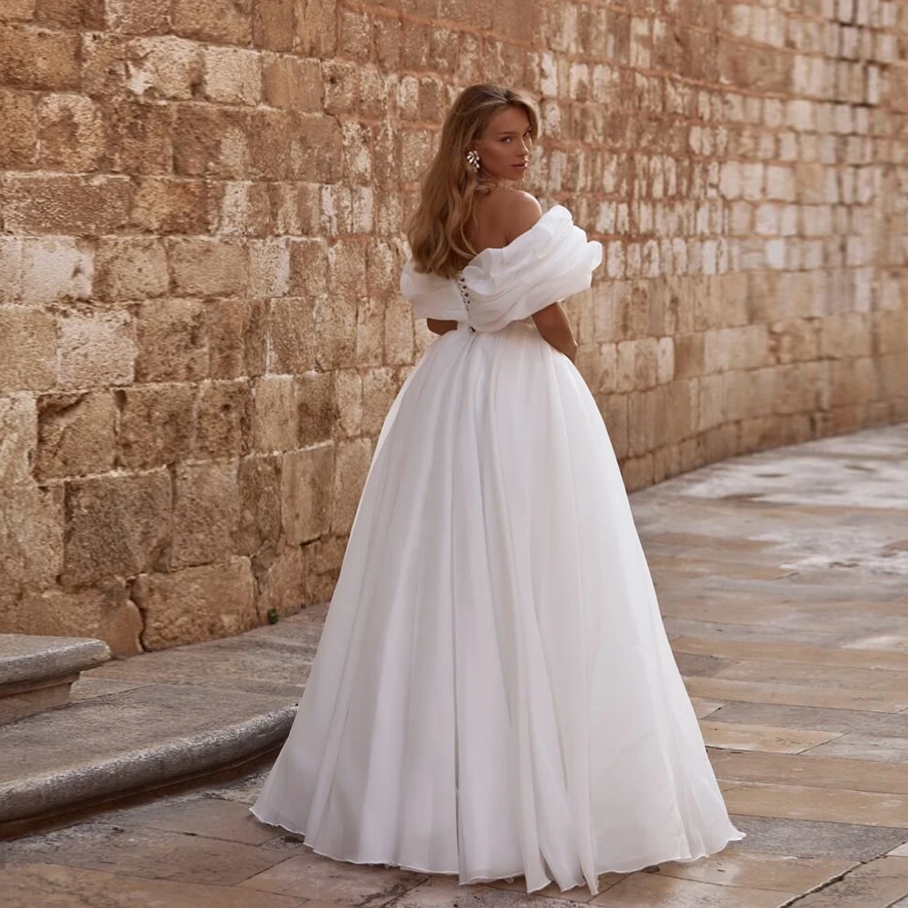 فساتين زفاف عاجية مخصصة مع الأورجانزا 2025 شق جانبي بدون حمالات كم كامل زي العرائس المرأة الصيف فيستدو دي نوفيا