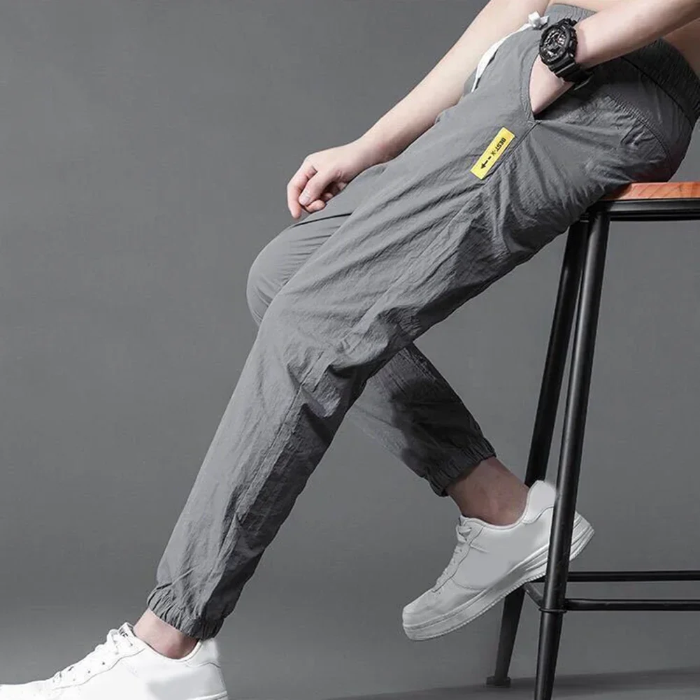 Summer Men's Casual Pants Thin Soft Elasticity Lace-up Waist Solid Color Pocket Applique Korea Loose Straight Sweat Trousers