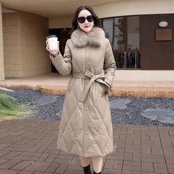 Nouveau Manteau de duvet long en cuir pour femmes Hiver Doudoune en peau de mouton à col en véritable fourrure de renard Cuir fendu Vêtements d'extérieur décontractés