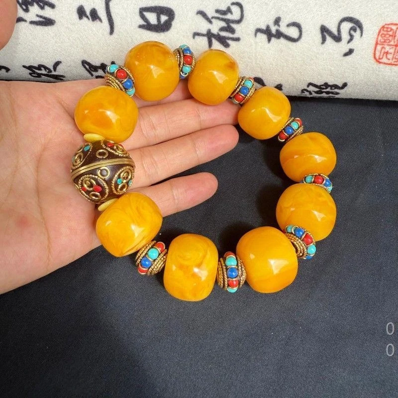25*20mm extra-large beads of chicken fat yellow amber bracelet, hand-twisted for lasting fragrance, with red and blue wheel-shap