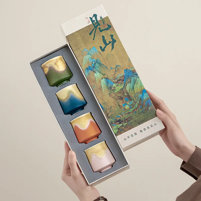 

Forbidden City Cultural and Creative Ceramic Tea Cup Set, a set of four-color kiln - changed tea cups with a master cup