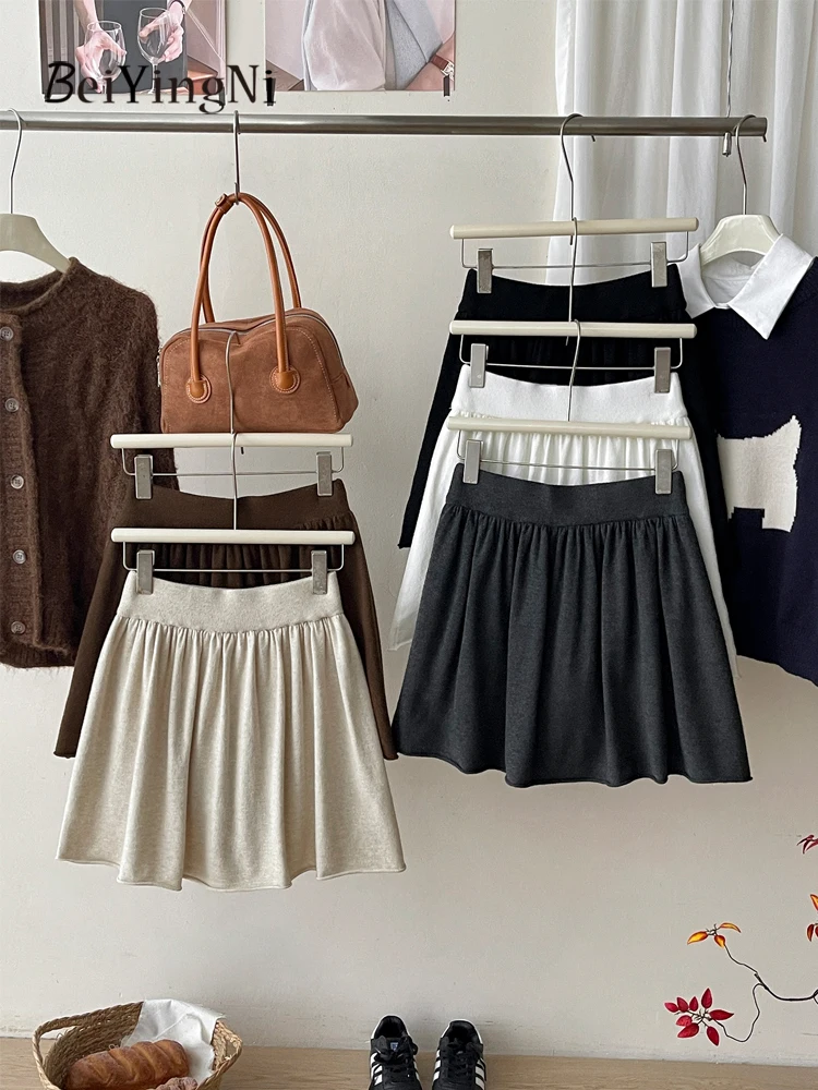 Beiyingni Donna Gonne a trapezio lavorate a maglia Tinta unita Moda coreana Elastico in vita Tutu Minigonna Francese Elegante Pianura Chic Gonne