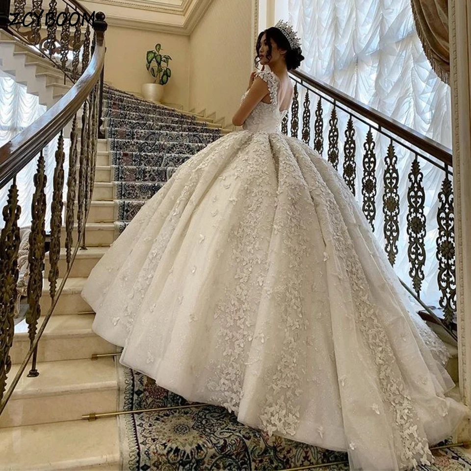 

Customized Spaghetti Strap Butterfly White Wedding Dress 2026 Ball Gown Floor Length Sweep Train Shiny Lace Up Bridal Gown