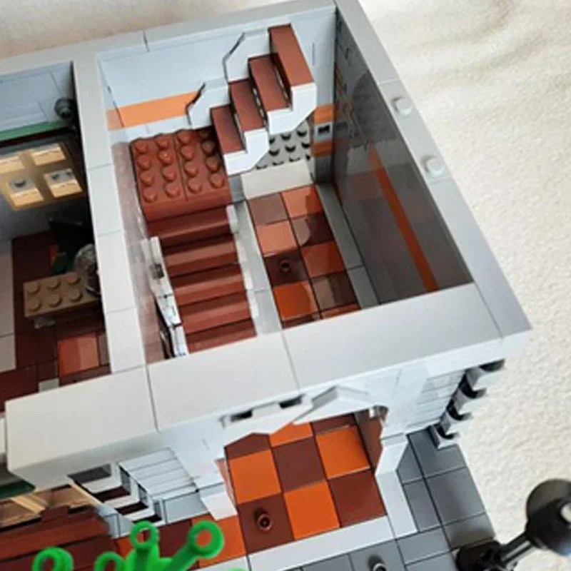Model Film Populer MOC Bangunan Bata Rumah Pahlawan Toko Kelontong Hijau Hadiah Teknologi Modular Setelan Mainan Rakitan Liburan Anak-anak