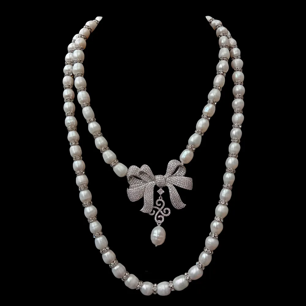 

2 Rows Cultured White Rice Pearl Necklace Bowknot Cubic Zirconia Pave Pendant