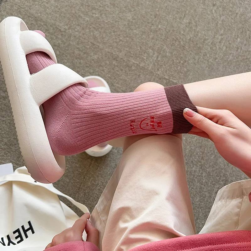 New candy colored solid pile socks with embroidered letters on the heel for sports socks