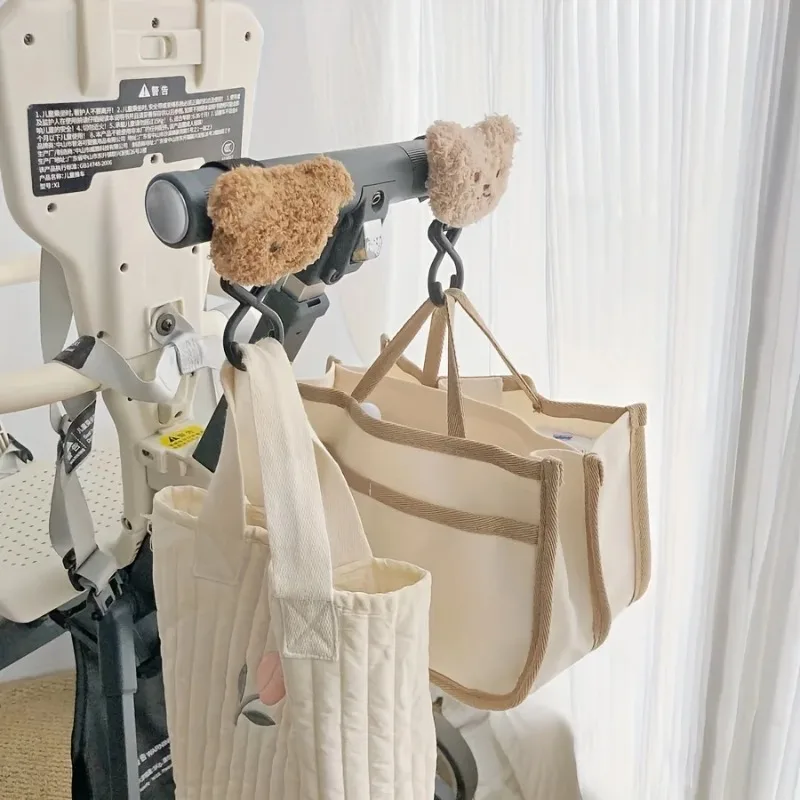 Niedlicher Plüschbär-Kinderwagen-Haken für Kinderwagen, robuster Universal-Kinderwagen-Aufhänger und Riemen, Kinderwagen-Zubehör für Mama