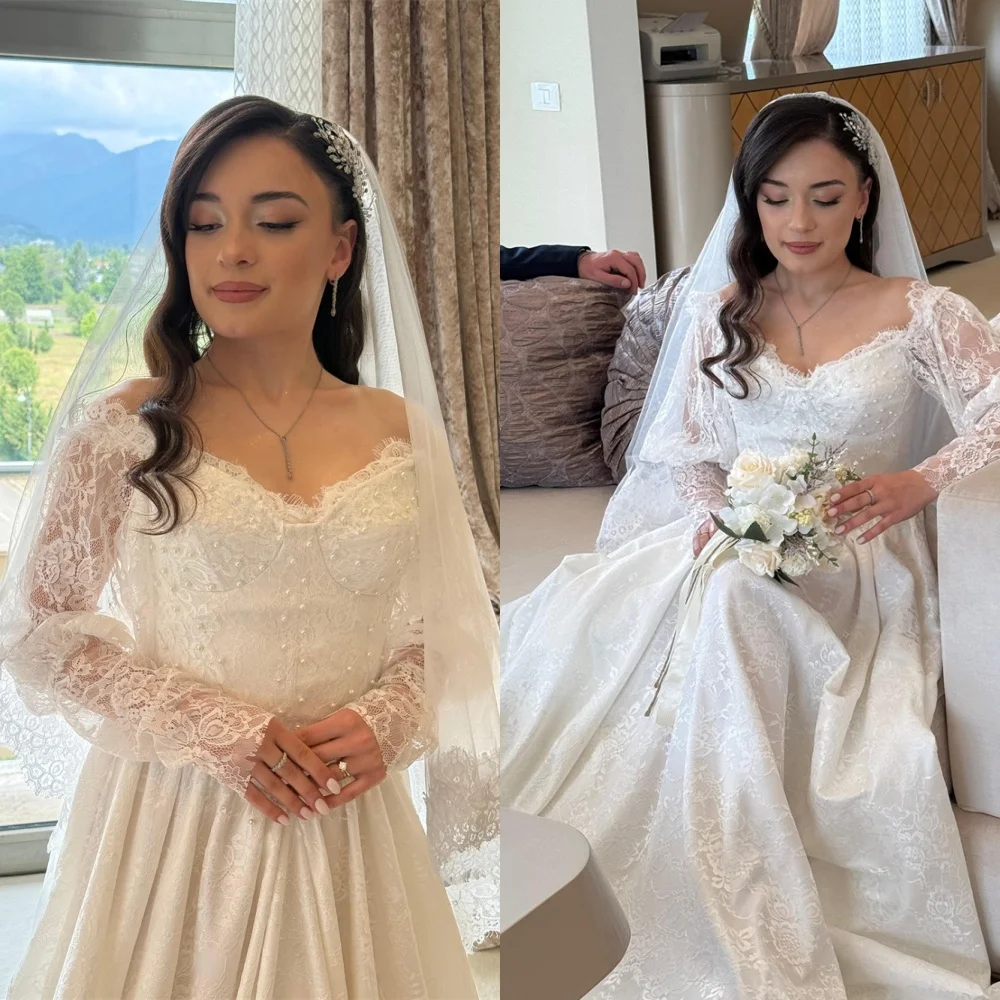 カスタマイズされた絶妙なホワイトジャージーブライダルドレスエレガントなストラップレス長袖ウェディングドレスチャペルトレインvestidoデノビア