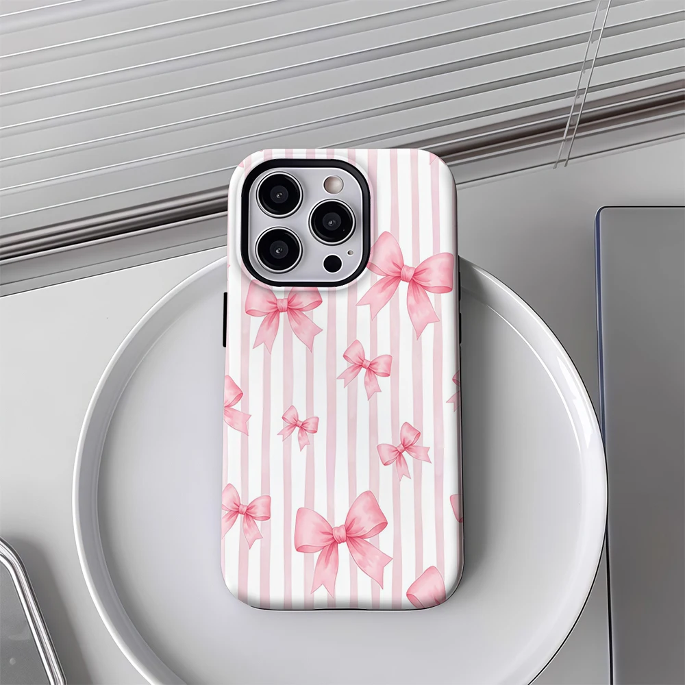 حافظة لهاتف آيفون 17 بنمط مخطط بفيونكة وردية يجب اقتناؤها لهاتف آيفون 17 16 15 14 13 12 برو ماكس بلس غطاء خلفي مزدوج الطبقة