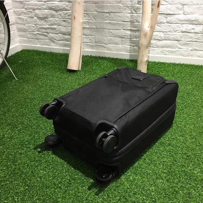 China Factory Ballistic Nylon Omega Shape Bar Handle Trolley Travelling Luggage Bags with 360 Degree Spinner 4 Wheels