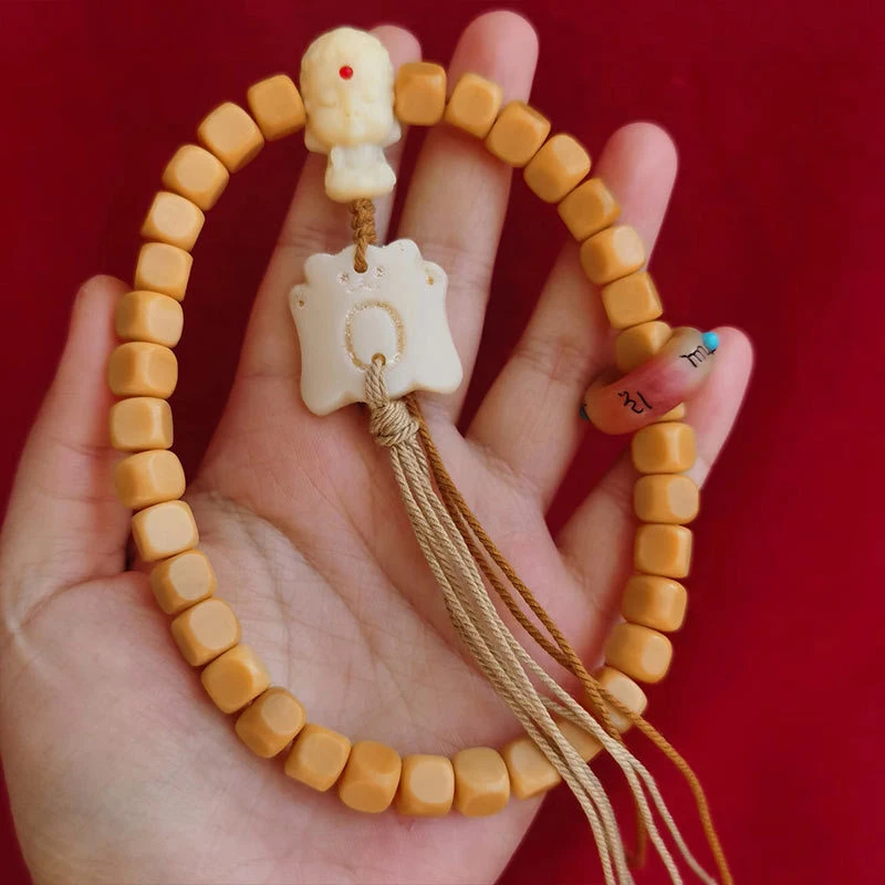 Chicken oil yellow cow bone and camel bone, solid and stable, hand-held fragrance beads paired with a boy's three-way inlaid run