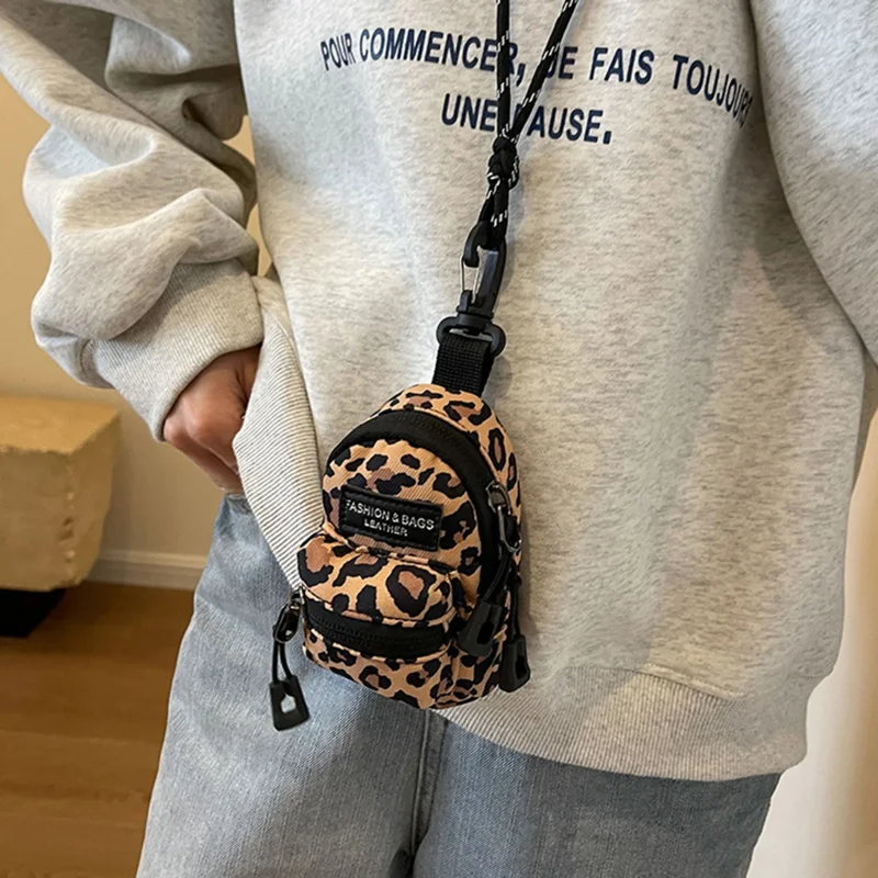 

Нейлоновый кошелек для монет, большая вместительная мини-сумка для хранения, сумка для наушников, женская и мужская портативная сумка через плечо для мальчиков и девочек, модный повседневный кошелек