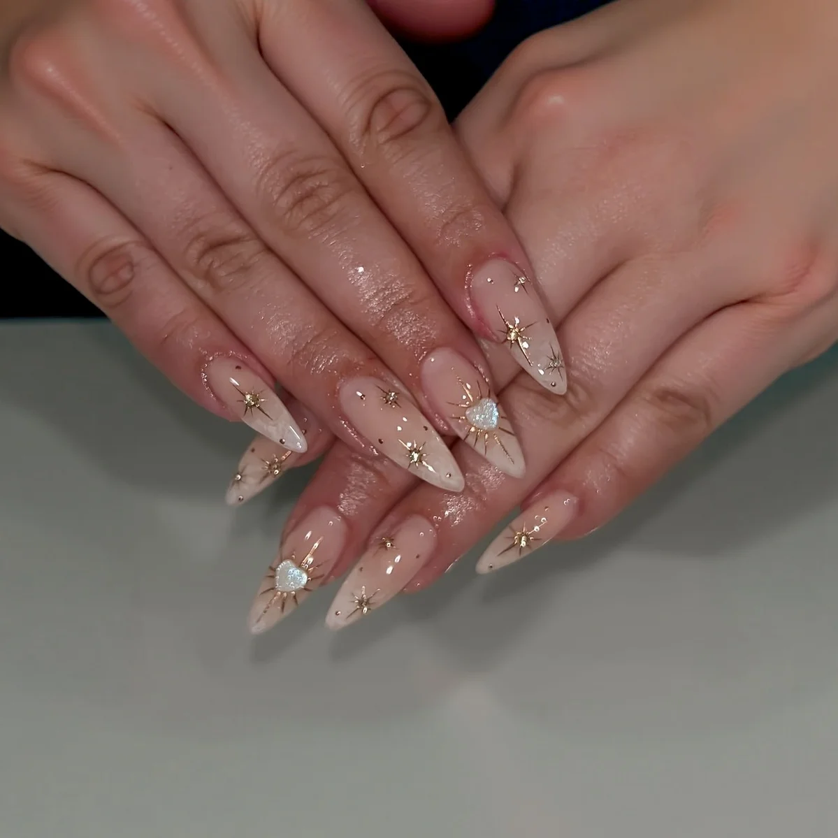 

24pcs Almond Shaped Press On Nails Glossy Full Cover Fake Nails Sun Starry Sky Heart Pattern for Women Daily Party Festival