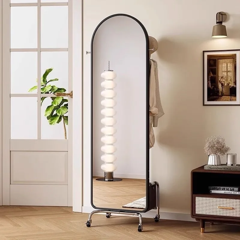 Rotatable and mobile vertical full-length mirror, multifunctional coat rack with wheels, light luxury