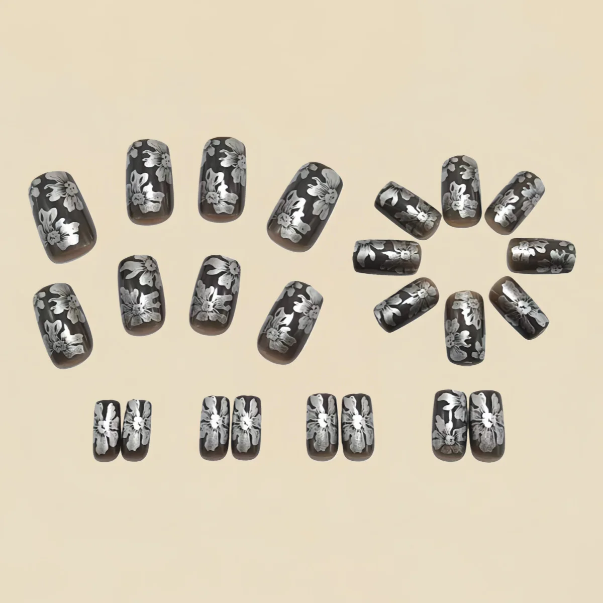 女性・女の子向けの短め・中程度のつけ爪、ゴールド・シルバーの葉っぱ・花柄デザイン、グラデーションオレンジ・グレー、アーモンド・スクエアチップ、プレスオンネイル