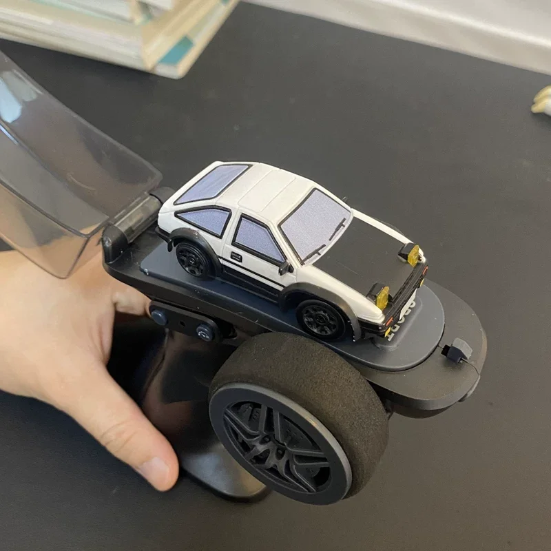 1/64 AE86 RC Drift Car with Jumping Headlights  2.4G Remote Control Desktop Drifting Toy Gift for Kids