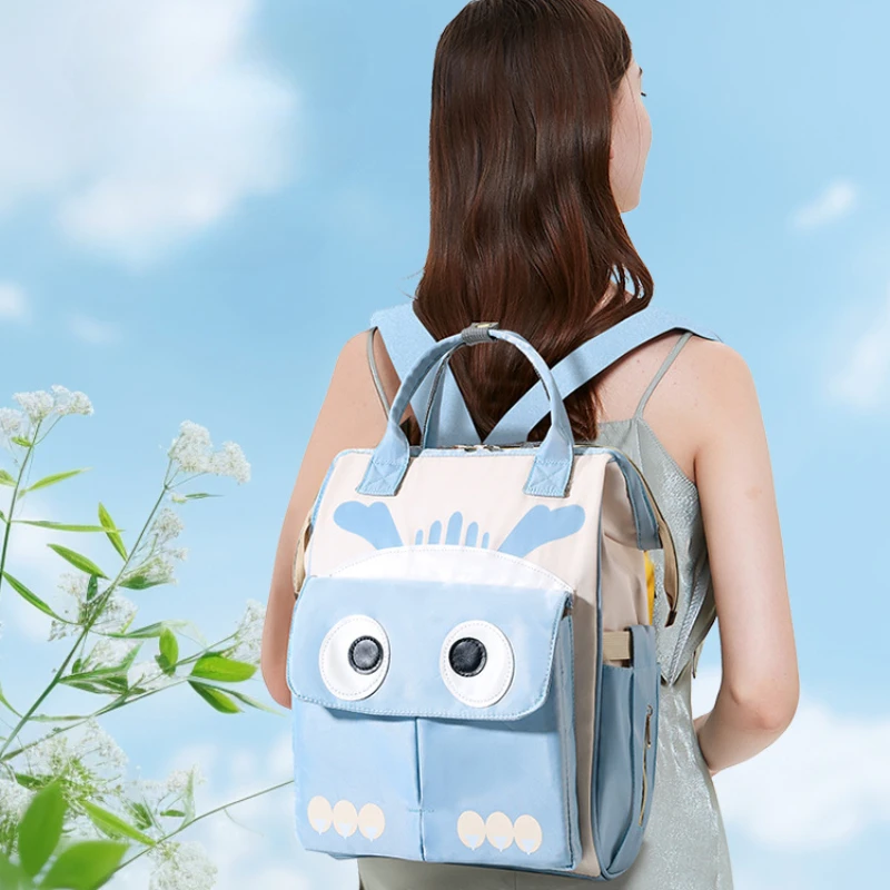 

2025 New Diaper Bag Backpack Cartoon Cute Baby Bag Multifunctional Baby Diaper Bag Backpack Portable Large Capacity High Quality