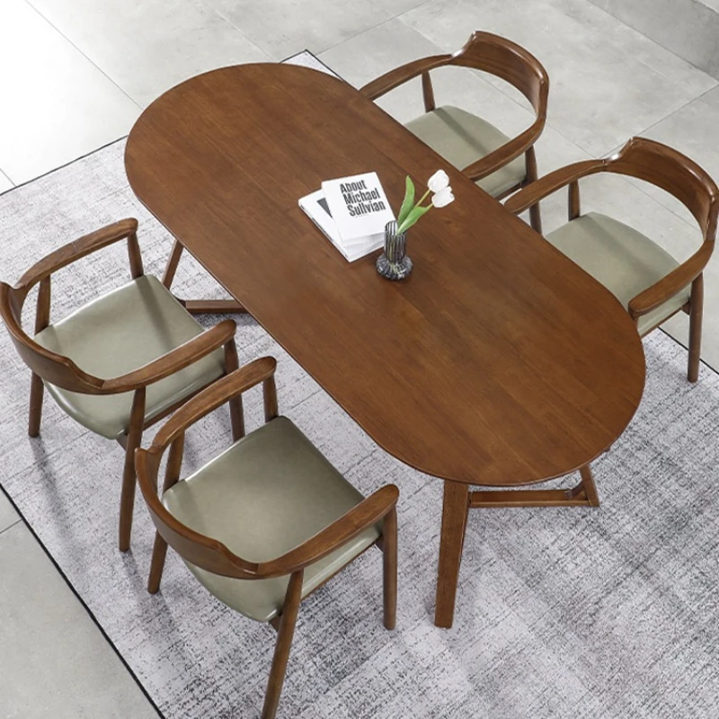 

Light luxury Nordic style solid wood oval long dining table home reception dining table B&B log negotiation table and chair
